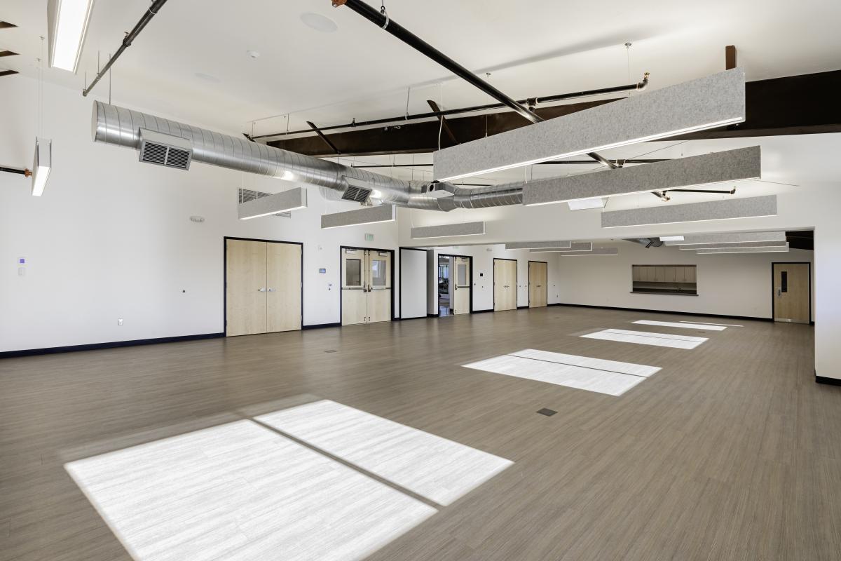 Largest meeting room showing access to the kitchen and lobby doors.